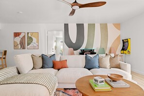 Bright airy living room & arcade game corner