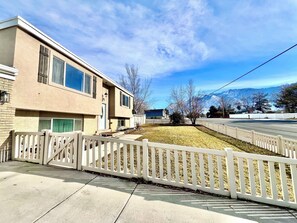 Beautiful view of the Wasatch mountains from the fully fenced front yard.  