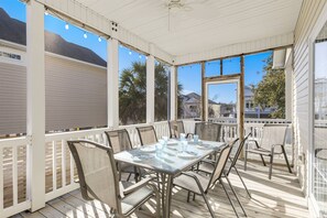 Enjoy the screened porch! Perfect for dining, relaxing, and enjoying the sunshine.