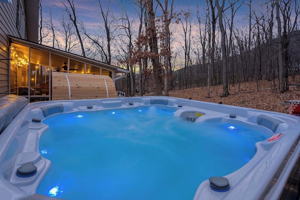 Unwind in the hot tub or relax in the private sauna, both offering serene views—your perfect retreat after a day of adventure. 