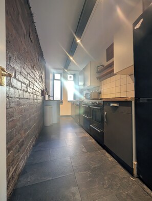 Kitchen - 6 hob over, microwave, coffee machine, and all the essentials 
