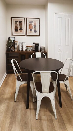 The dining room is bathed in natural light, creating a bright and inviting space where every meal feels special.