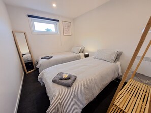 Second bedroom set up with 2x Single beds (alternatively, can be set up with 1x King)