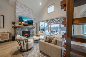 Bright living space with comfy seating and Smart TV