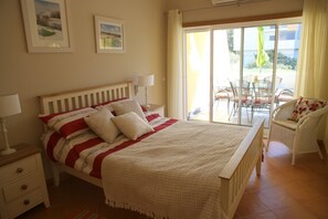 Double bedroom, with electric shutter blinds and air conditioning.