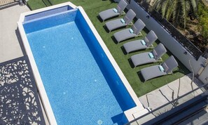 Private heated pool with sun loungers in luxury villa for rent in Ciovo, Trogir