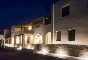 Facade of the property under the night light