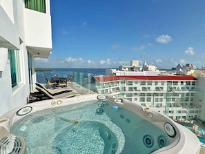 Penthouse 1 of 2:  Enjoy Spectacular Views in the Privacy &amp; Comfort of your own place.  The 4 Person Hot Tub is an Amazing Touch!  In Cancun, you have the Ocean on one side &amp; the Freshwater Lagoon on the other. You are Surrounded by Beauty Here.