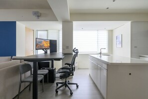 Convenient Workspace:
• Herman Miller Office Chair
• Height Adjustable Desk
