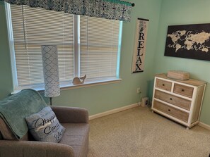 Bunk room.  Double size on top and queen on the bottom.  Chair makes a single.