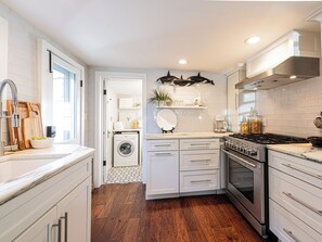 Kitchen area with modern amenities
