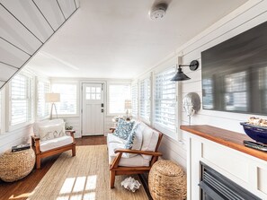 Living room area and a flat screen TV
