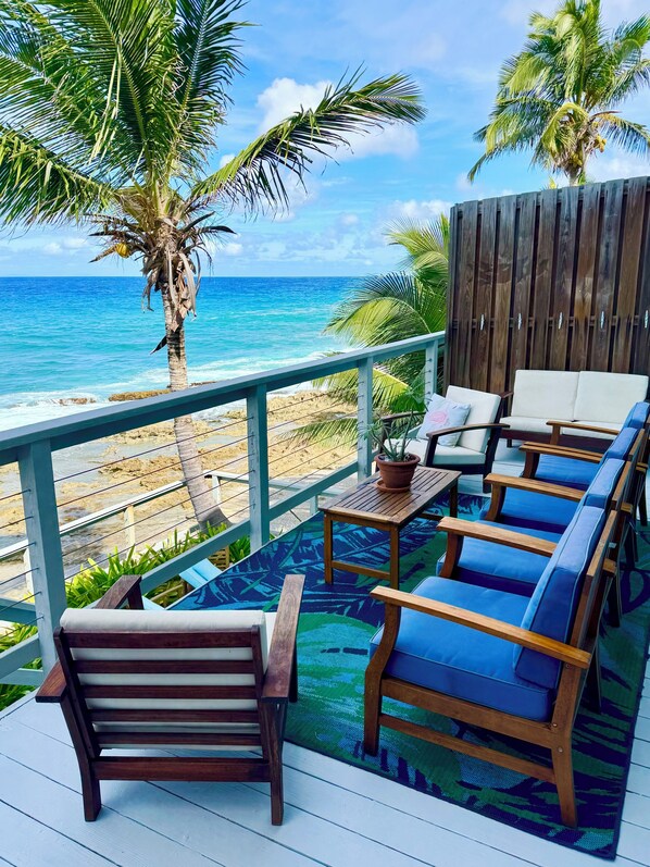 Spacious deck with the sights and soothing sounds of the north shore.