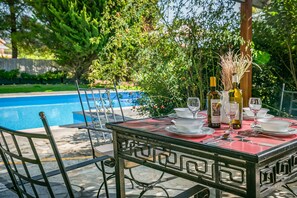 Perfect moments on shaded patio next to the pool