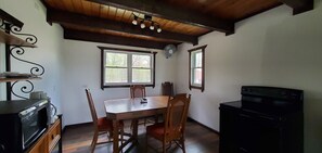 Dining table and coffee hutch face with independent lighting.
