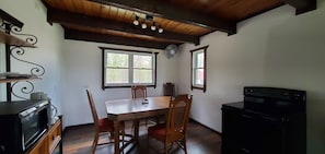 Dining table and coffee hutch face with independent lighting.