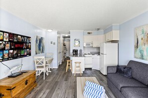 Open-concept living with a fully equipped kitchen and smart TV!