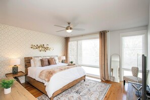 Master suite with comfy King bed, private en suite full bath, and walk in shower