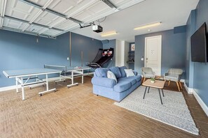 Game room in garage is the perfect fun spot for the group.   
