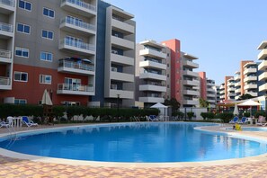 Enjoy a refreshing swim in a beautifully designed outdoor pool.