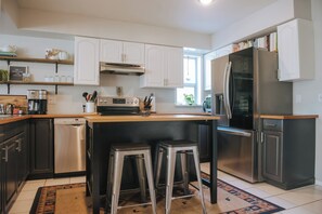 Fully equipped open-concept kitchen