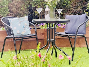 The patio outside the kitchen is a bit of a sun trap.