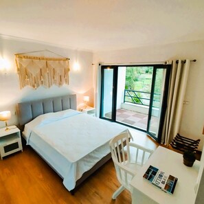 Main room with access to the balcony and a private terrace.