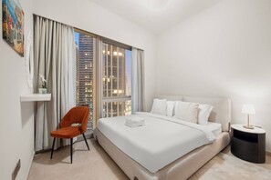 Bedroom Retreat: Enjoy stunning skyline views from this elegant, light-filled haven!
