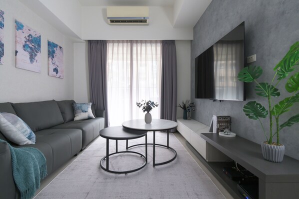Cozy & Stylish Living Room:
• 65" Smart TV w/Channels
• Open Space w/Dining Area