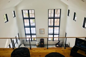 View from the top of the open loft space (that has 2 full sized murphy beds)