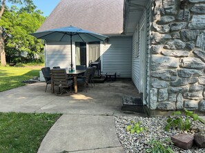 Patio off of garage and blue room.