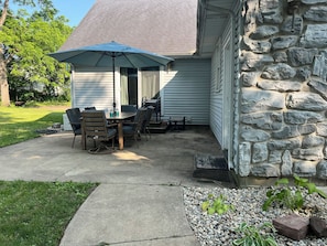 Patio off of garage and blue room.