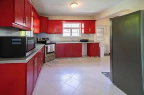 The fully equipped , spacious Kitchen.