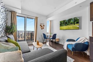 Cozy living space with a 55-inch smart TV and plenty of seating