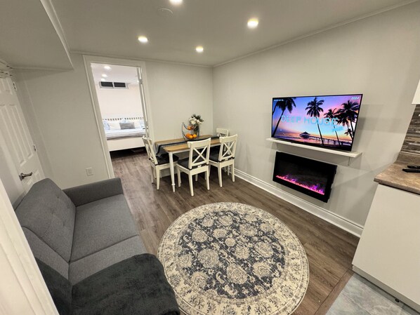 Living room, couch unfolds to a twin