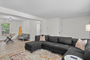 Living room open to game room. 