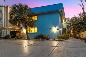 Front of Unit at twilight.  Ample parking and entrances on right