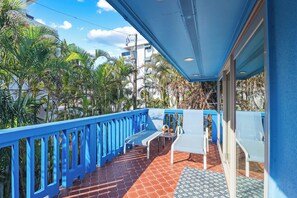 Sand Castle 2nd floor balcony with chaise lounges