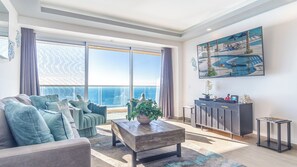 sliding glass doors open onto the balcony from the living room