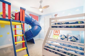 A Toy Story themed bedroom 3 with a twin top and full-sized bottom bunk bed.