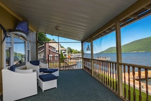 Imagine relaxing on your private patio, where the gentle breeze whispers through the trees and the shimmering waters of the lake stretch as far as the eye can see. This serene outdoor space offers the perfect escape for those who appreciate nature’s