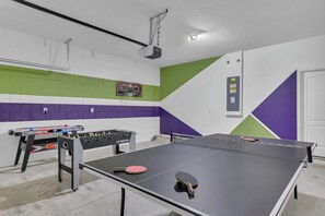Game Room with Air Hockey, Foosball, ping pong and a place to shoot some hoops!