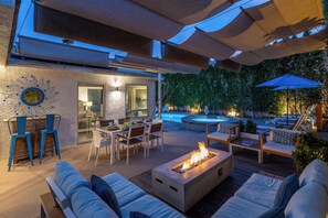 Enjoy a glass of wine around the cozy fire pit
