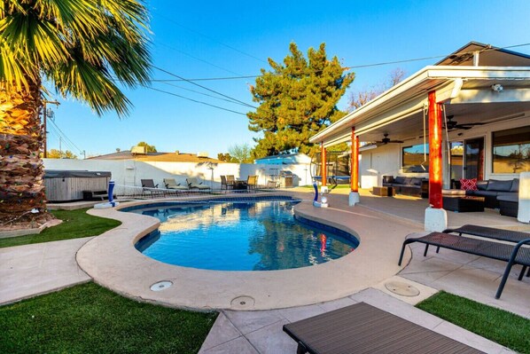 Dive into the refreshing private pool and soak up the sun in style.