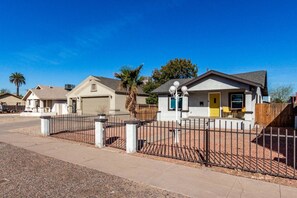 Charming exterior with a covered front porch, perfect for morning coffee or evening chats.