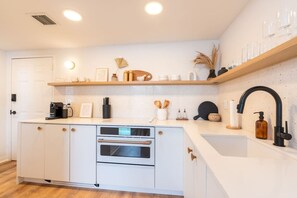 Fully equipped kitchen ready for your culinary creations.