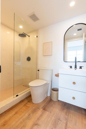 Pristine bathroom with modern amenities for your comfort.
