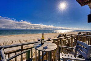Imagine sipping wine with a loved one on this deck, enjoying the serene ambiance and breathtaking views as the sun sets over the Gulf.