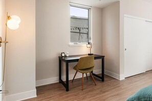 💻 Workspace - Dedicated desk space for remote work or planning your day