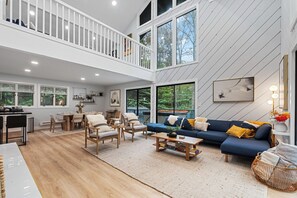 Living room that comfortably sits 8